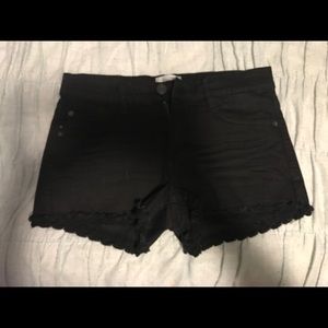 Black denim shorts